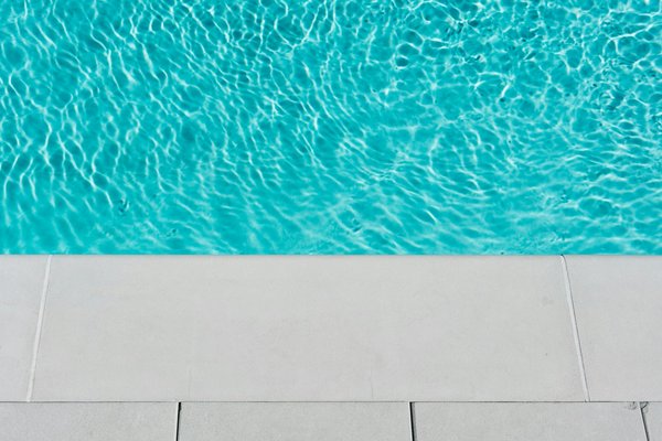 What are the implications of using high-tech pool cleaners in the UK?